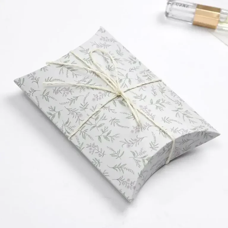 Silver pillow boxes with curved tuck ends