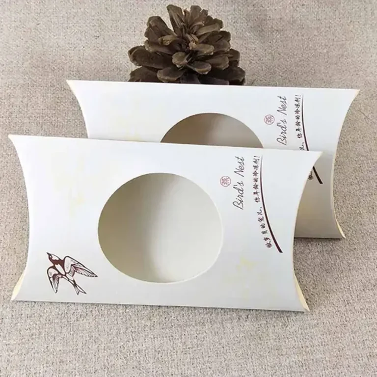 Pillow boxes with a clear window showing the product